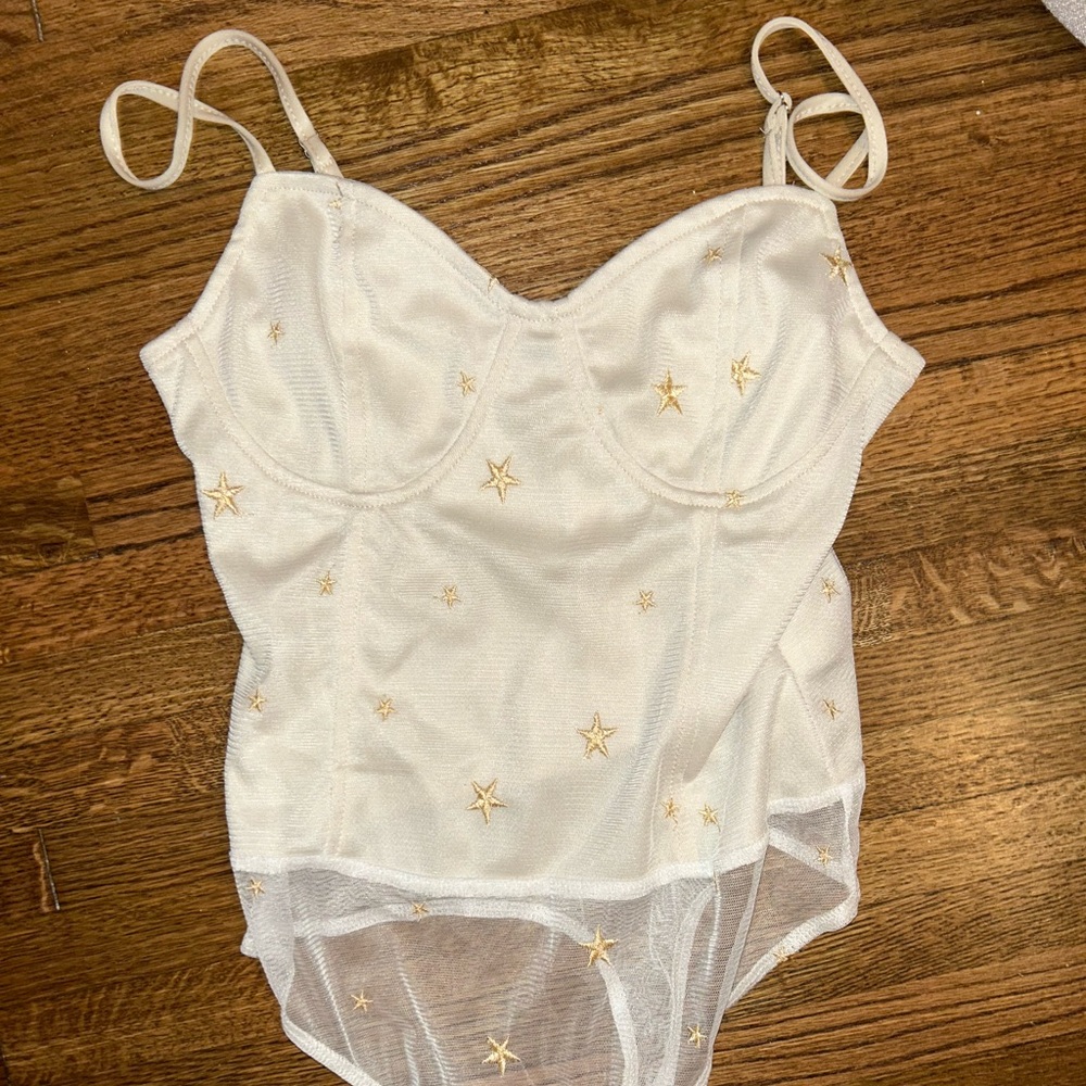✨boutique light cream bodysuit with stars✨